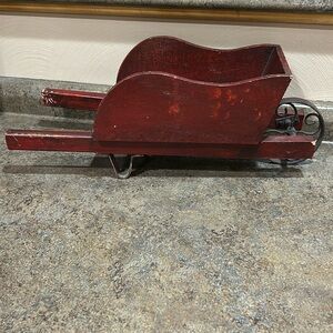 Little decorative wheelbarrow. 19” x ￼7”￼x 7” in fair condition, smoke free home